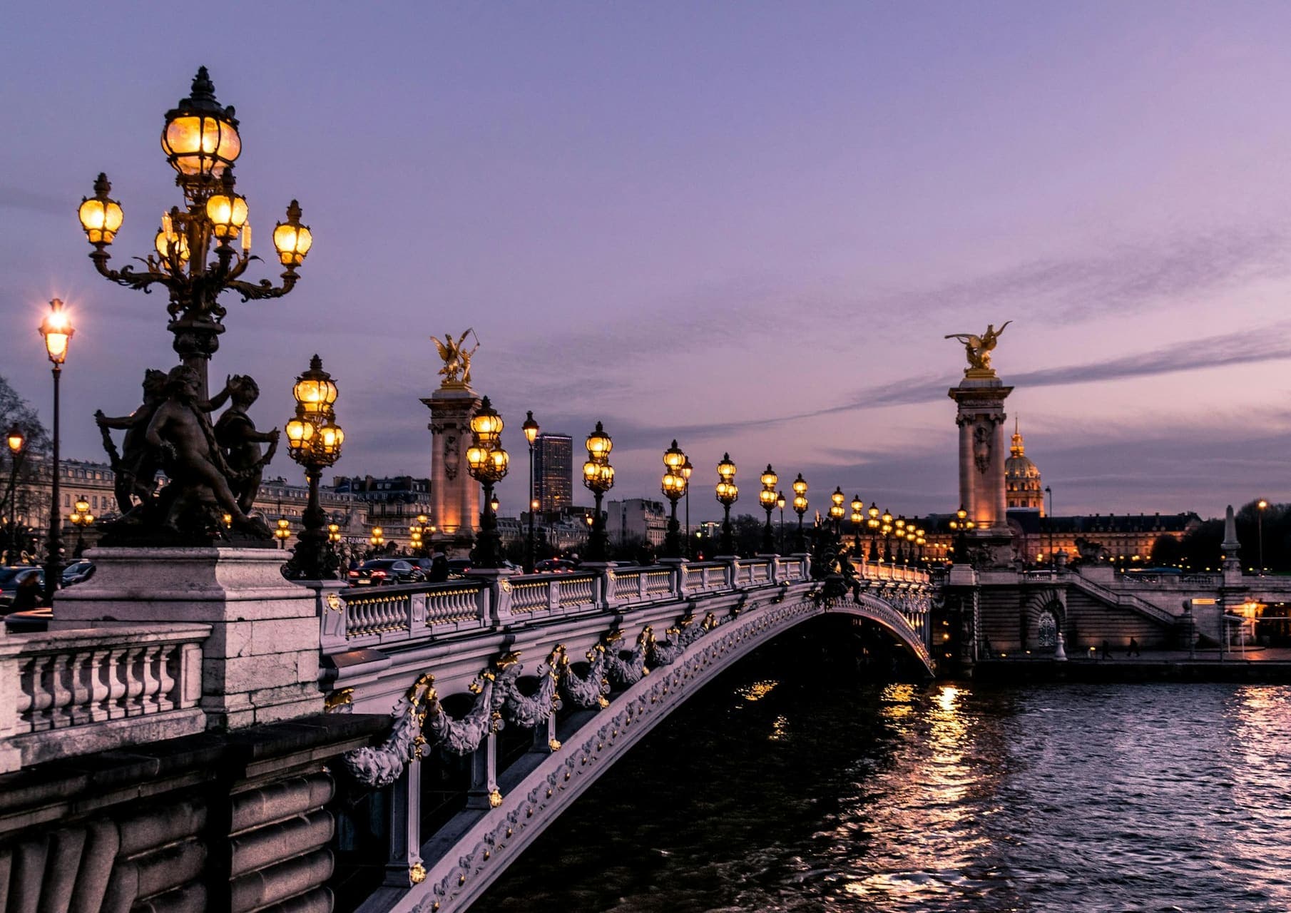 Paris rooftops at dusk for a private Europe luxury retreat